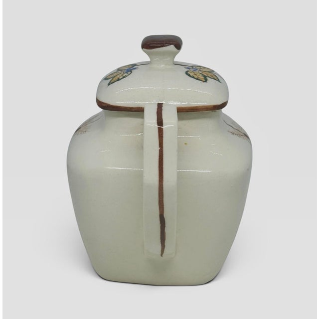 Mid 20th Century Ceramic 5 1/4” Lidded Creamer Jug Hand-painted Floral Berry Motif. This vintage, cream-colored ceramic...