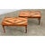 A very unique pair of vintage mid-century French coffee tables inlaid with parquet flooring on the top surface mixing...