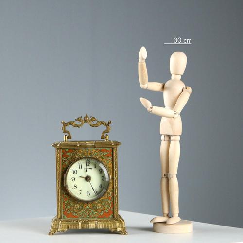 Carriage clock in engraved bronze. Stamped metal plates with polychrome Art Nouveau decoration. Arabic numeral hour dial,...