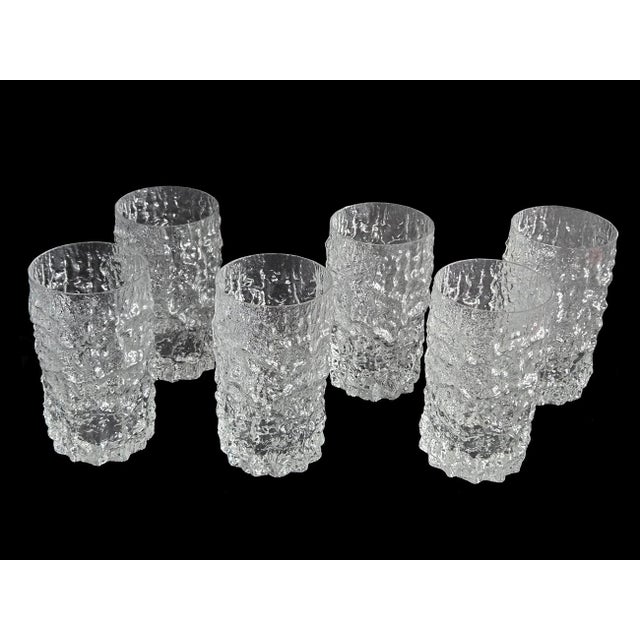 Offered is a set of 6 Glacier or Flint Bark pattern textured highball glasses designed by Geoffrey Baxter for the...