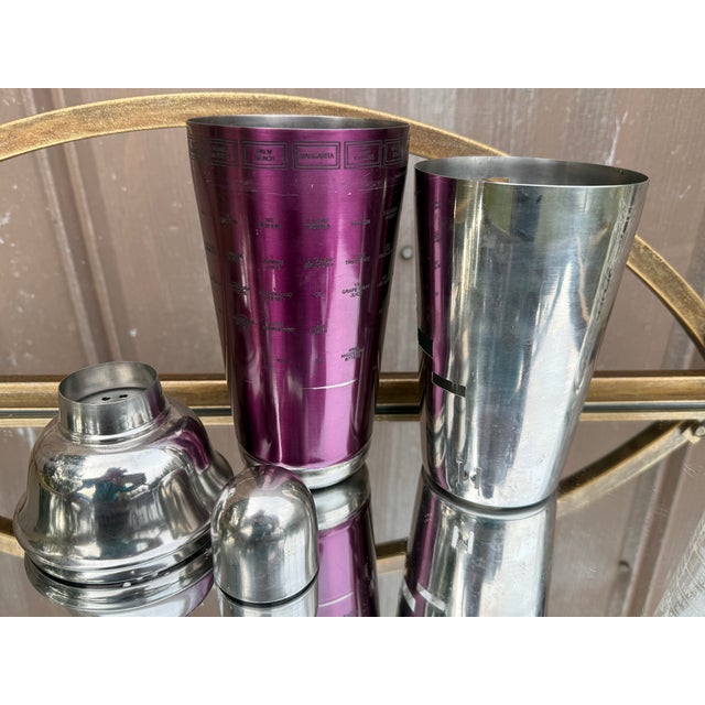 Dial a drink with this fabulous millennial era metal cocktail shaker with burgundy drink mixing menus! 3.25 x 10.5 inches...