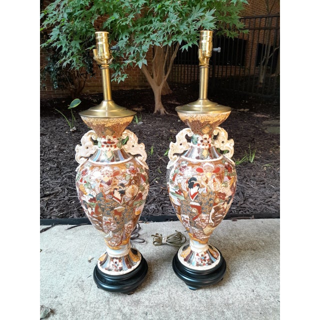 I love the muted Earth Tone color scheme of these Exquisite lamps showing many Japanese scenes and symbols. A beautiful...