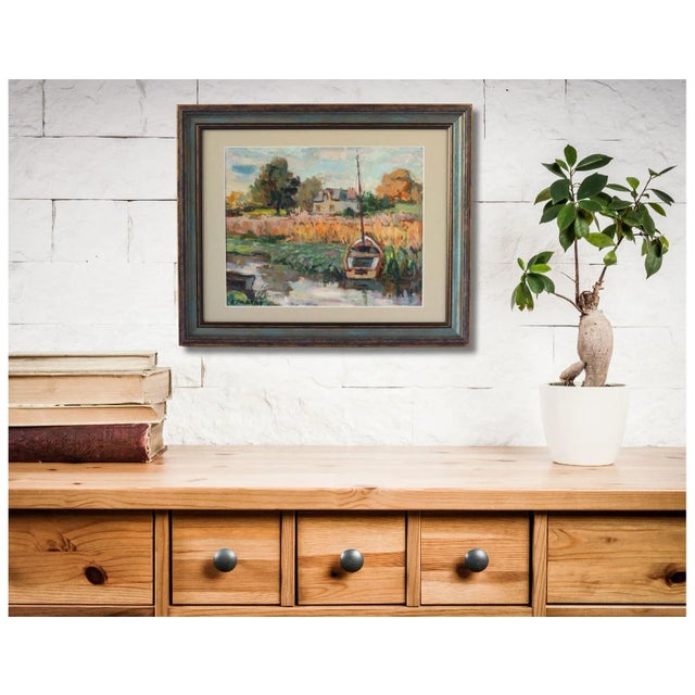 Experience the serene beauty of rural France with this early 20th-century oil on board. The painting depicts a tranquil...