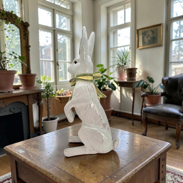 A monumental glazed terracotta rabbit sculpture produced by Earth Needs Ltd. of Petaluma, California. Modeled in an...