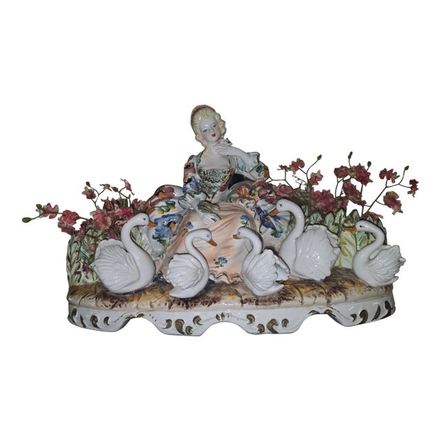 Vintage Capodimonte Italian Porcelain Figurine Features a Maiden With Five White Swans and Floral Accents. For Sale