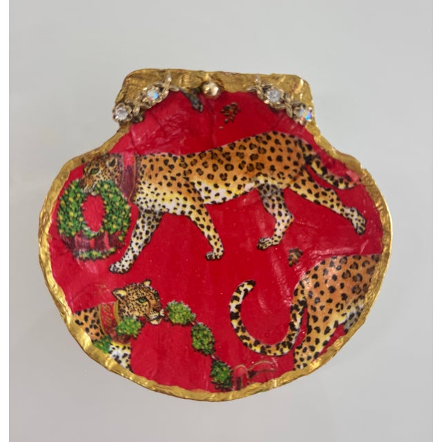 Bring a touch of haute-couture Christmas glamour to your home with this limited-edition Maison Martine shell art...