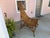 Mid-century Mexican Scorpion chair with a dramatic high back and handwoven natural fiber seat. It's sculptural silhouette,...