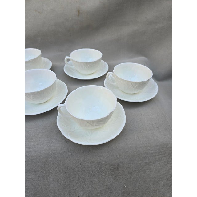 This is a set of 7 cups and saucers from the legendary Coalport collection from England. They are made of fine bone china...