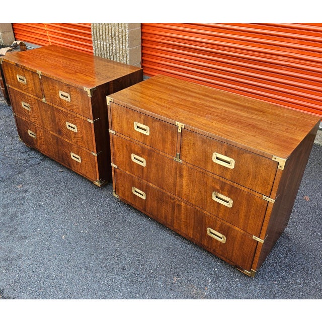 This Mid-20th-Century Pair of Henredon Campaign Bachelor's Chests is outstanding and elegant, made of rich solid wood and...