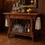Early 20th century Victorian ball and stick accent table, which can function beautifully as a dry bar, with a drawer for...