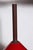 Scandinavian Modern Tapio Wirkkala Teak hanging pendant with red cased glass Vistosi shade. Featuring a suspended 12.5H...
