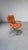 Orange/brick red cowhide office chair, made in Norway by Ring Mekanikk in the 1960s. The chair is height-adjustable...