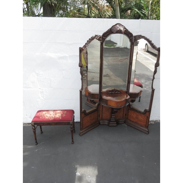 This rare Vanity Table and Stool is made out of wood, solid wood, walnut, mixed wood, burlwood, veneer, mirror, and...