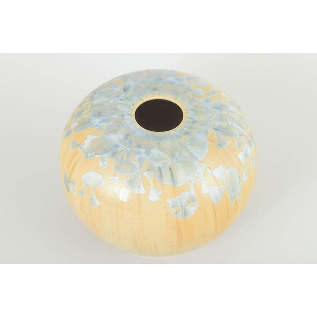 European Studio Potter Vase, late 20th century. Thrown stoneware vase with crystalline glaze in shades of light blue and...