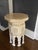 Very chic vintage Moroccan-style accent table in a cream-white painted finish. Removable octagonal tabletop is inlaid with...