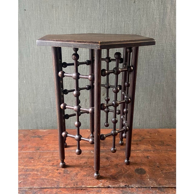 Stylish little table that would be great for a glass of wine or a plant! Finish has been cleaned up and waxed.