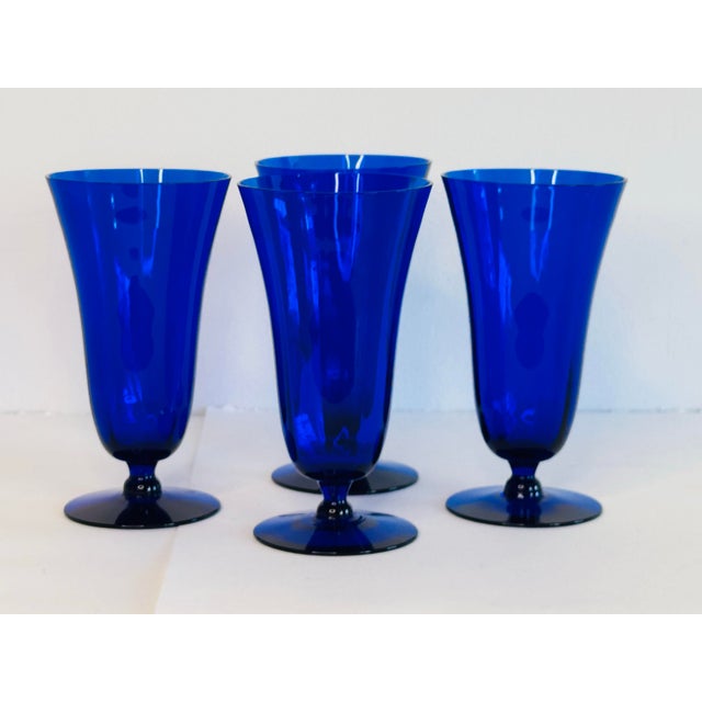 Art Deco Style Cobalt Parfait Glass Stems, Set of 4. The stems have a vertical line design. No marks.