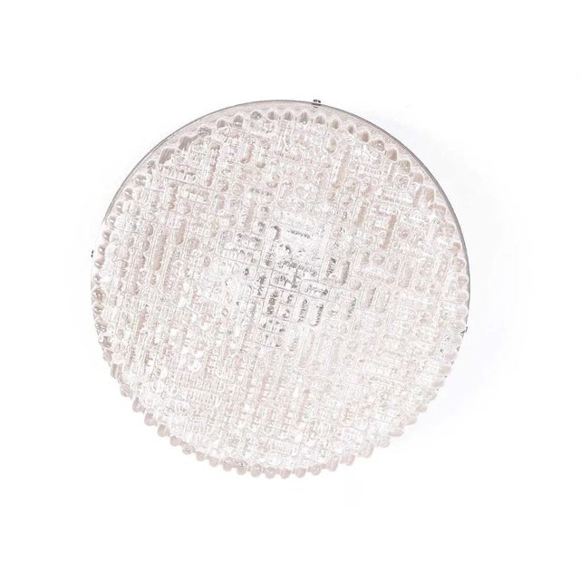 This wall or ceiling light is produced by Staff Leuchten (Germany). They are made of thick structure glass and have 3...