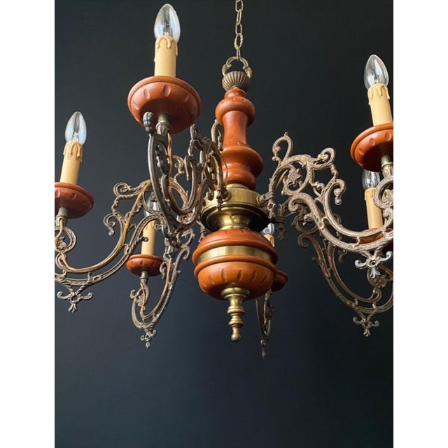 The chandelier is made of brass - very beautiful artistic forging. Decorated with handmade wooden elements. Chandelier...
