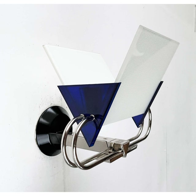 Two murana wall lights by the renowned manufacturer arteluce, designed by perry a. King and s. Miranda in the 1980s. Rare...