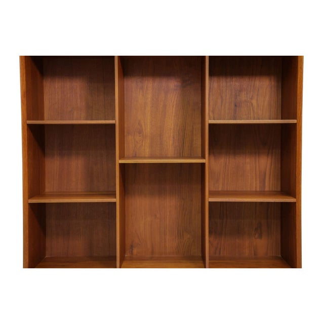 Mid-century Danish bookcase designed by Peter Hvidt, for Soborg Denmark, 1952-56. Finely crafted of solid teak, the open...