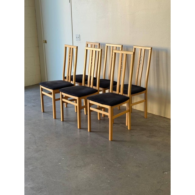 Set of high-back Italian dining chairs, crafted by IMS SRL in Italy. These architecturally inspired pieces showcase strong...