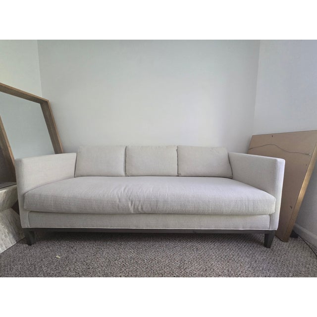 The LEE Industries 3583-03 Sofa is a high-quality, made-to-order, stationary sofa featuring a modern, sleek design with a...