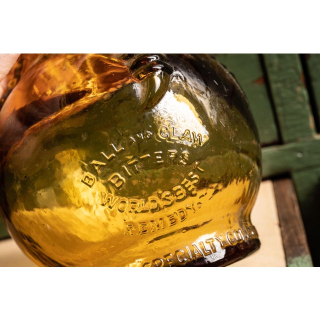 Vintage 1930s Ball and Claw Bitters Bottle Chairish