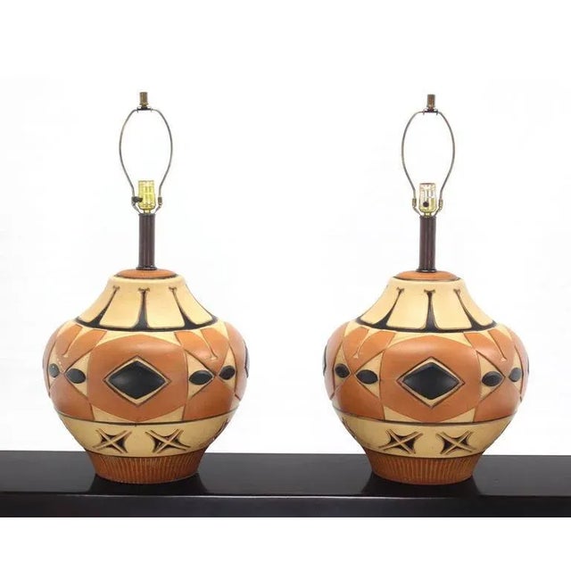 Pair of mid-century modern art pottery table lamps. The bases were once vases.