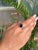This elegant Garnet Solitaire Ring is beautifully crafted in 925 Sterling Silver with a modern double-row band design. The...
