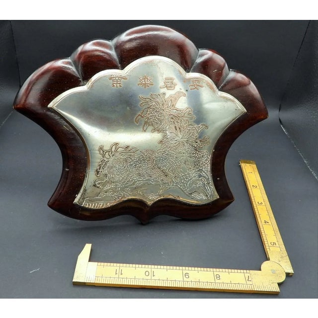 This marvelous Japanese fan-shaped writer's plaque is created in gorgeous silver plate on a dark wood shield and was made...