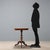 Rolo coffee table in walnut, elm, and various woods. Shaped legs and turned frame with ebonized wood parts. Inlays in...