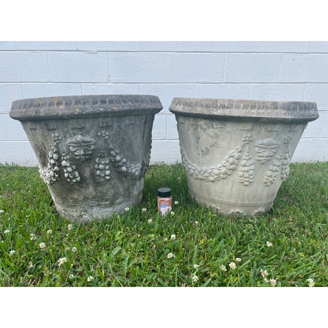 Title: Description: A magnificent pair of mid-century cast stone planters featuring a rich Neoclassical design. Rescued...
