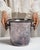 This mid 20th century ice bucket from France is finished in eggplant, worked in silver. Its form follows honest, well-...