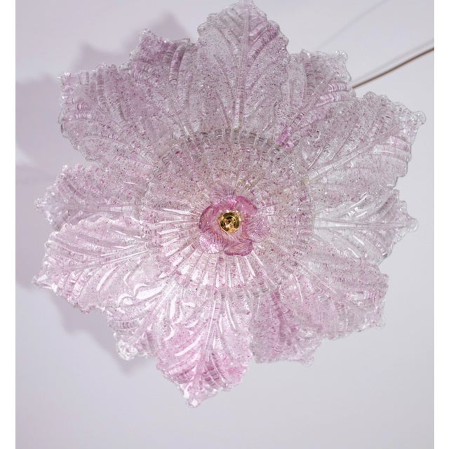 Set of 2 Splendid Murano pink glass ceiling lamp. Period: circa 1970. The light mounts 6 standard European e14 lamp...