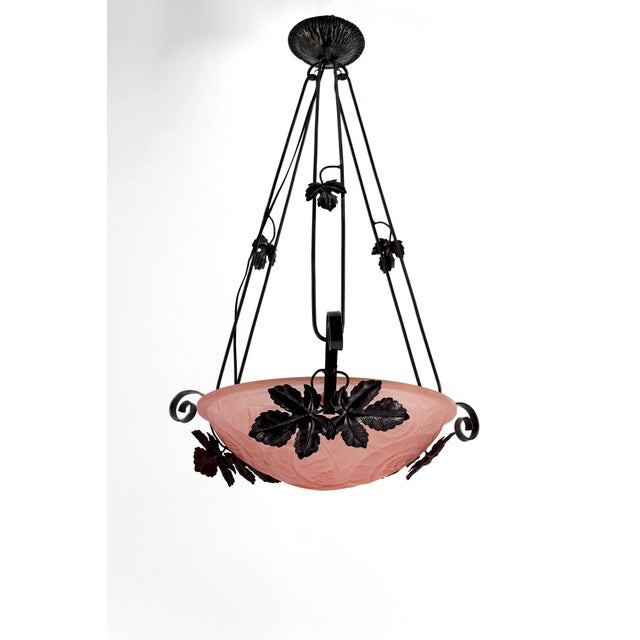 Important Suspension / Chandelier in Wrought Iron with Vine Decoration, Pressed-Molded Pink Glass Bowl with Geometric...