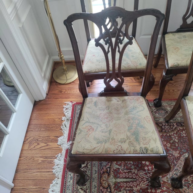 Set of two Only English Chippendale mahogany Side Chairs Circa 1880 Each chair with a carved Shape Crest over a Pierced...
