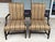 This pair of Ethan Allen High Back Arm Chairs features tall upholstered backs, gently curved wood arms, and classic...