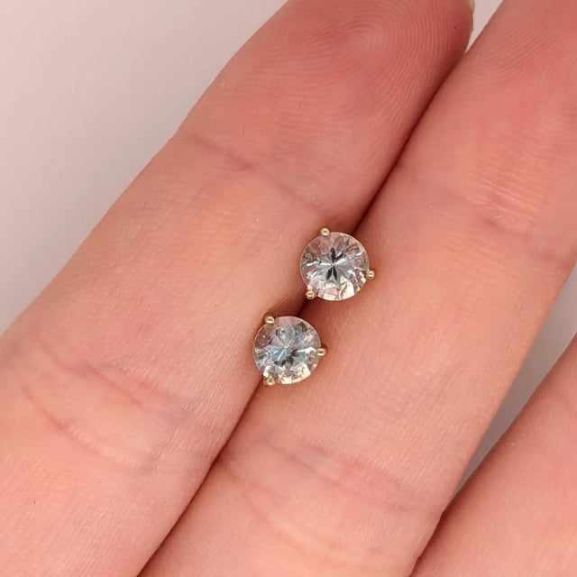 Simple and sweet, these dainty stud earrings provide gorgeous blues that sparkle in the sun. These studs can be worn all...