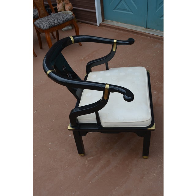 This is a very solid/sturdy chair by Century, NC. Black lacquer & brass. White cushioned seat, affixed. Great accent piece...