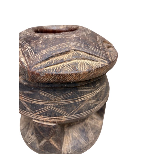 Vintage Hand-Carved African Tribal Lidded Vessel A beautifully hand-carved African tribal lidded vessel crafted from a...