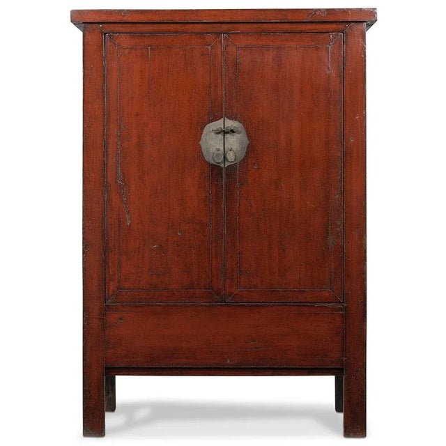 This beautiful red lacquer cabinet is from Shanxi, circa 1860. with a simple yet elegant design and original iron...