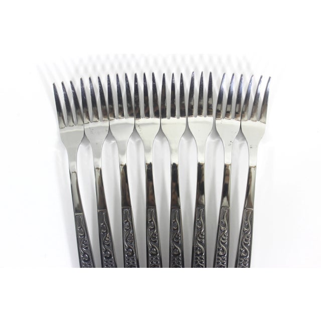 Set of 8 Towne Hall pattern stainless steel long, small cocktail forks from the sixties. Classic mid century style....