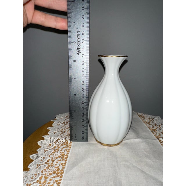 Elegant vintage Christian Dior Art de la Table porcelain vase, crafted in Japan. Minimalist white glaze with delicate gold...
