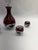 Bring classic mid-century elegance to your home bar with this Vintage Silver Overlay Glass Decanter set. Crafted from deep...