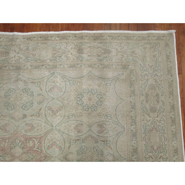 An elegant Turkish Sivas carpet with soft pink, green and ivory hues. 8'2'' x 12'3'' Sivas is a city in North Central...
