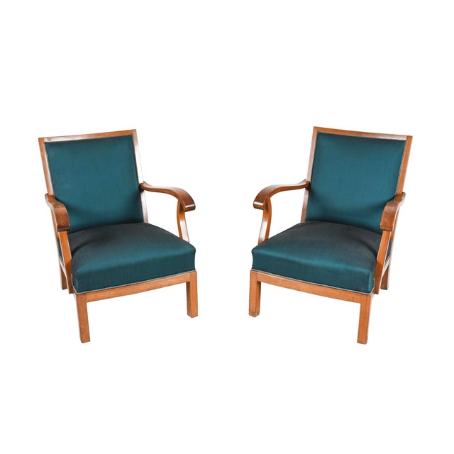 Designed by architect and furniture designer Erik Wørts, these lounge chairs were hand-crafted in the 1950s. They are...