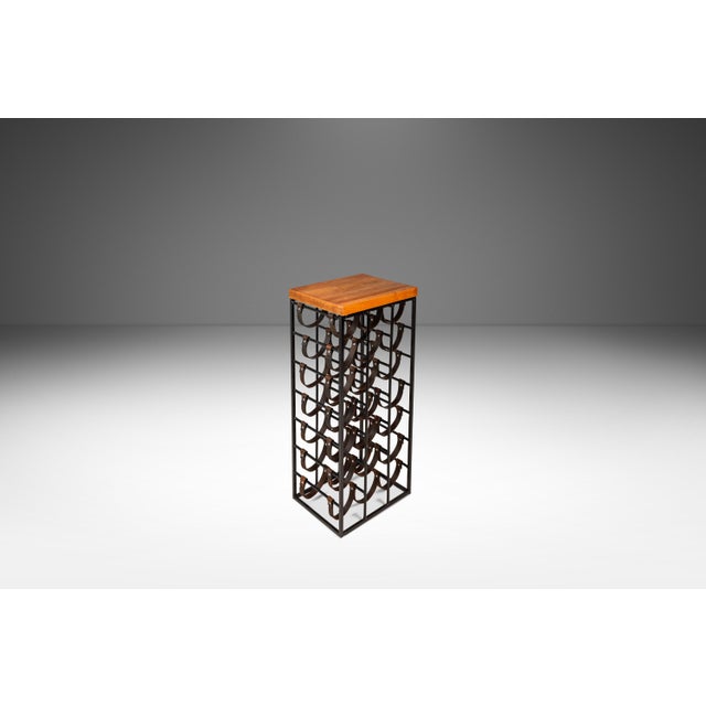 Introducing an instantly recognizable wine rack designed by the influential Arthur Umanoff. Constructed from a solid...
