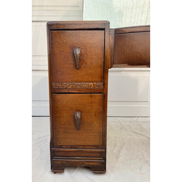 This elegant mirrored vanity dates to the 1930's and reflects the refined craftsmanship and restrained geometry of the Art...