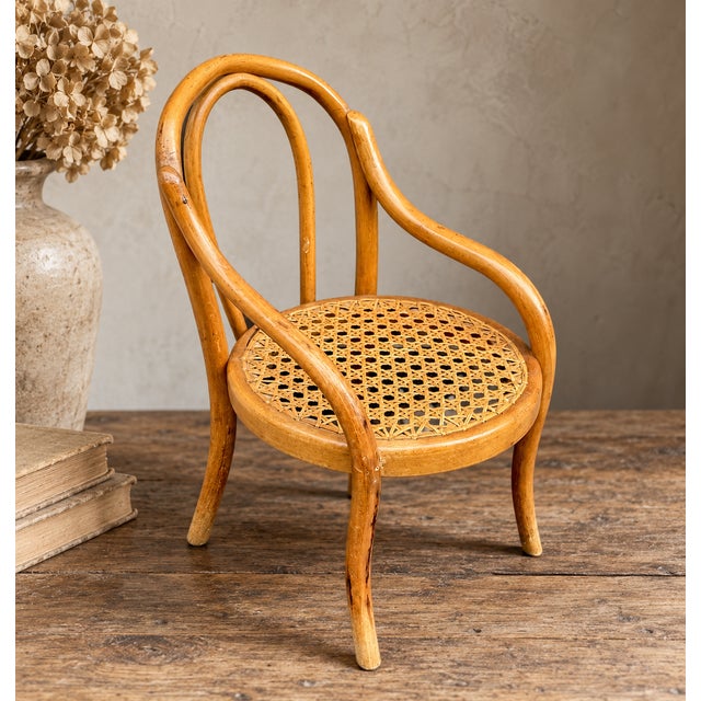 Rare antique miniature doll chair, attributed to Gebrüder Thonet, dating from circa 1890–1910. The chair is made from...